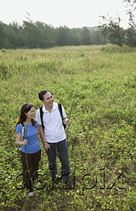 AsiaPix - Man and woman hiking in nature, outdoors