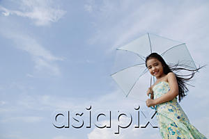 AsiaPix - Young girl holding blue umbrella, smiling