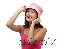 AsiaPix - Young woman wearing pink hat and smiling
