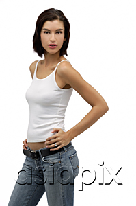 AsiaPix - Young woman looking at camera with hands on hips