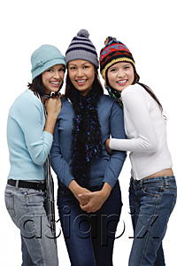 AsiaPix - Three young women wearing scarves and hats, winter
