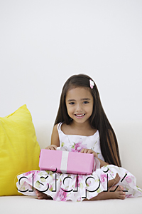 AsiaPix - A young girl with a birthday present
