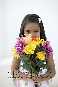 AsiaPix - A young girl with a bunch of flowers