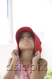 AsiaPix - A young girl with a red hat