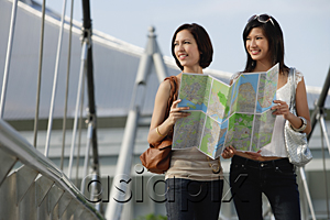 AsiaPix - Two friends check a map together