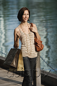 AsiaPix - A woman with lots of shopping bags