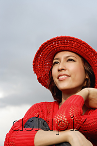AsiaPix - A woman with a red hat and top
