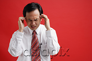 AsiaPix - A man with a headache