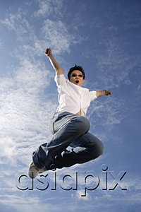 AsiaPix - A young man jumps for joy