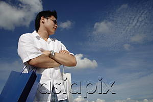 AsiaPix - A young man with shopping bags