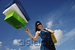 AsiaPix - A young woman with shopping bags