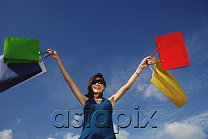 AsiaPix - A young woman with shopping bags
