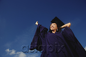 AsiaPix - A young woman dressed in her graduation gown
