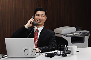 AsiaPix - A businessman on the telephone