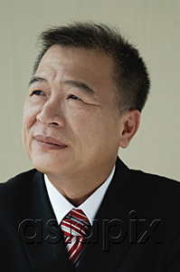 AsiaPix - A portrait of a man in a suit