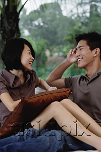 AsiaPix - A young couple smile at each other