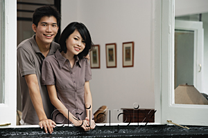 AsiaPix - A young couple smile at the camera together
