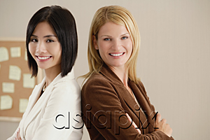 AsiaPix - Two female colleagues smile at the camera together
