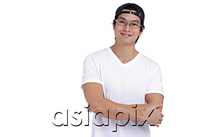 AsiaPix - A man crosses his arms and smiles at the camera