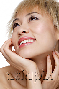AsiaPix - A young woman with dyed blonde hair smiles