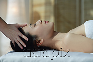 AsiaPix - A woman has a relaxing massage