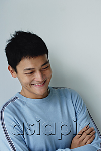 AsiaPix - A man crosses his arms and smiles