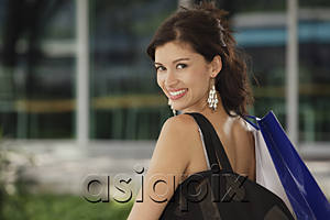 AsiaPix - Woman with shoulder bag, looking at camera