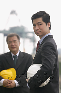 AsiaPix - Businessmen with helmets looking at camera
