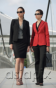 AsiaPix - Two businesswomen looking into distance