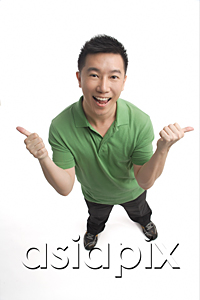 AsiaPix - Man smiling at camera and giving two thumbs up