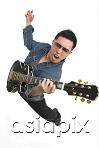AsiaPix - Man playing guitar enthusiastically