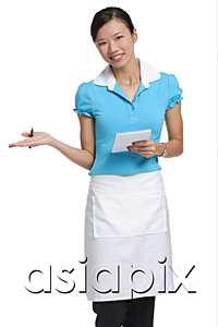 AsiaPix - Waitress smiling at camera, holding notepad