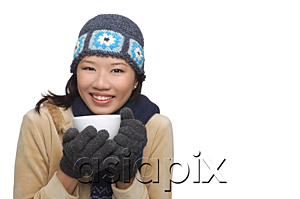 AsiaPix - Woman freezing and smiling at camera