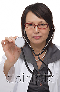 AsiaPix - Doctor holding up stethoscope and looking at camera