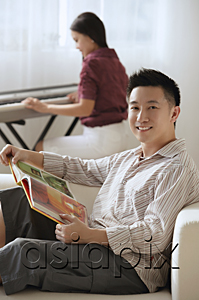 AsiaPix - Couple relaxing at home