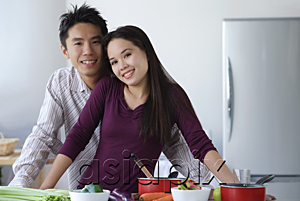 AsiaPix - Couple together in the kitchen