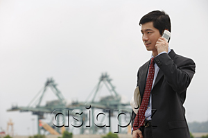 AsiaPix - Businessman talking on the phone