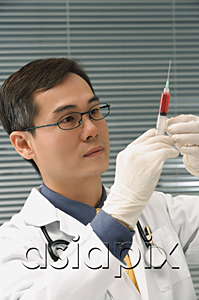 AsiaPix - Doctor preparing hypodermic needle
