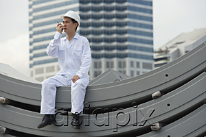 AsiaPix - Man with walkie talkie giving directions