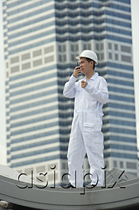 AsiaPix - Man with walkie talkie giving directions