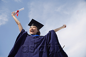 AsiaPix - University student in graduation robe cheering