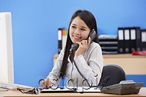 AsiaPix - Businesswoman talking on the phone