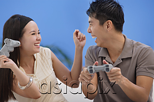 AsiaPix - Couple playing video games