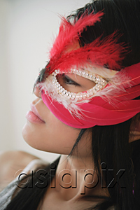 AsiaPix - Young woman in feather mask