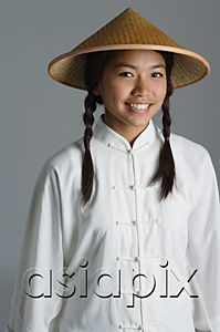 AsiaPix - Young woman in traditional Chinese dress smiling at camera