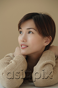 AsiaPix - Young woman looking into distance