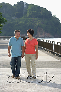 AsiaPix - Couple strolling along the waterfront