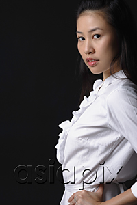 AsiaPix - Young woman looking at camera