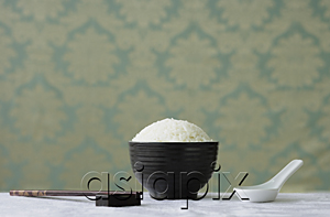AsiaPix - Bowl of rice with chopsticks