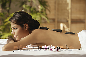 PictureIndia - A woman relaxes at a spa